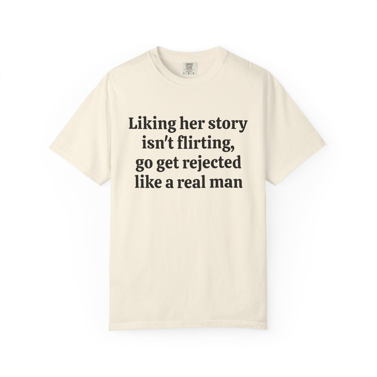 Ivory Rejected Like A Real Man tee with black serif text, front view