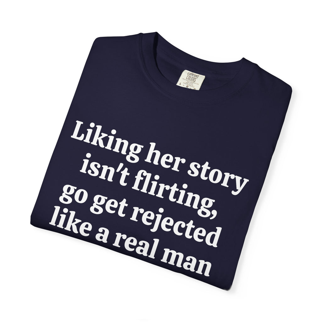 True Navy Rejected Like A Real Man tee folded, close-up of white print