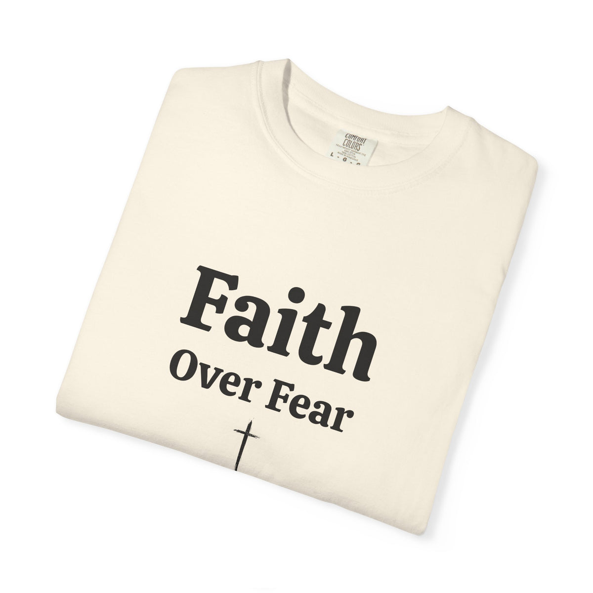 Ivory Faith Over Fear tee folded, close-up of print
