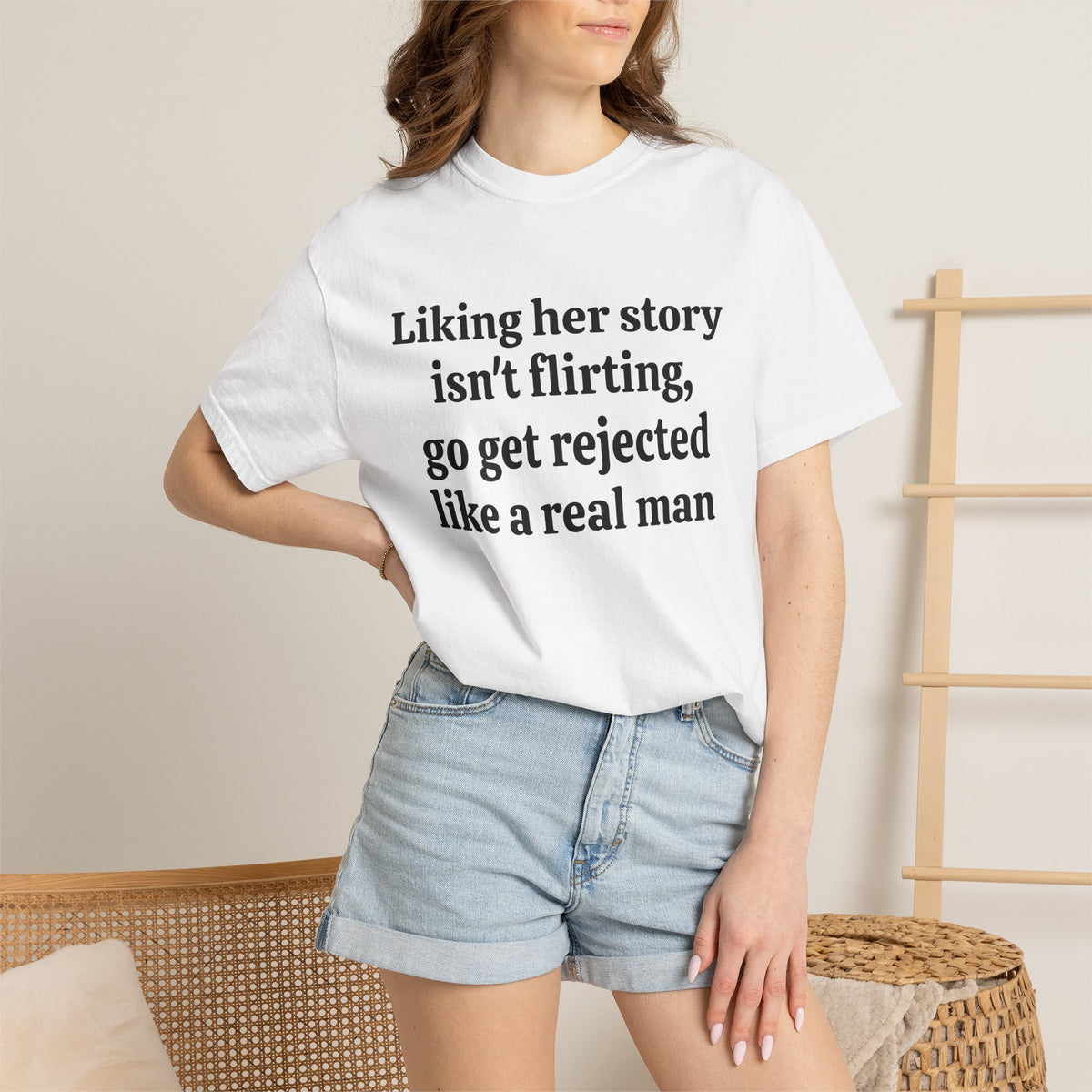 Model wearing White Rejected Like A Real Man tee with denim shorts