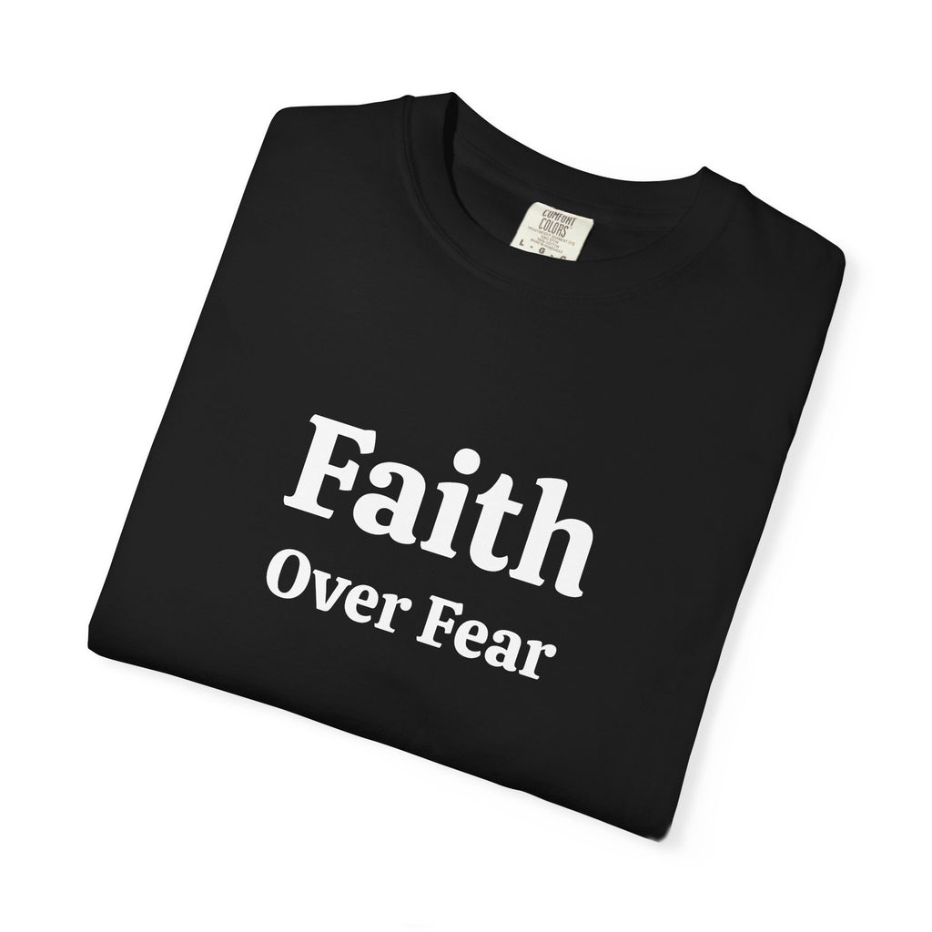 Black Faith Over Fear tee folded, close-up of white print